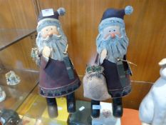 Two Painted Metal Santa Christmas Decorations