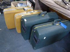 Four Hard Plastic Travel Cases