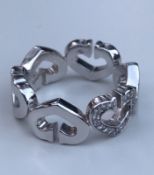 Cartier Hearts and Symbols Diamond Ring set in 18k White Gold