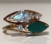 1970s Diamond and Emerald Crossover Ring