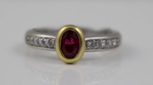 Ruby Yellow Gold Surround Diamond Ring