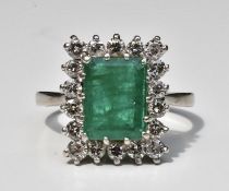 Emerald and Diamond Ring set in 18k White Gold