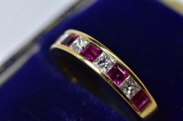 Tiffany & Co Diamond and Ruby Eternity Ring set in 18k Yellow Gold.