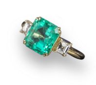 Emerald and Diamond Three-Stone Ring set in 18k Yellow Gold