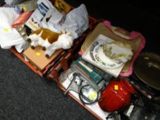 Two crates of miscellaneous household items including boxed games, CDs, DVDs, binoculars & camera