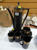 A Portmeirion black & gold Greek key part-coffee set