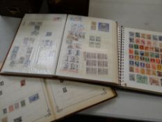 Three vintage collector's albums, mainly foreign stamps