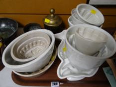 A parcel of brassware & vintage pottery jelly molds including heavy metal Oriental lidded jar