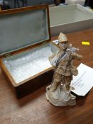 A bisque Boer War wounded trumpeter soldier figurine with 925 silver trumpet circa 1900