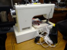 A Frister & Rossmann electric sewing machine E/T