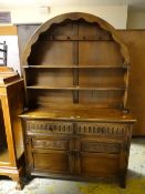 A vintage oak arch topped dresser