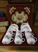 A vintage boxed Royal Crown Derby 'Derby Posie' six coffee can set