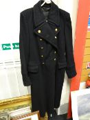 A naval brass effect buttoned double breasted great coat