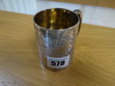 A hallmarked silver christening mug