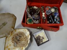 Jewellery box containing quantity of costume jewellery, mainly brooches together with boxed pearls