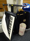 A Farfisa TK100 electric keyboard & stand together with a ceramic stick stand & blazer E/T