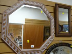 A modern wooden framed & decorated bevel wall mirror together with a smaller beaded wooden frame