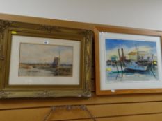A framed watercolour of a canal scene with windmills & a framed watercolour of a beached boat in