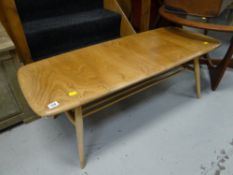 An Ercol blonde wood Long John coffee table with lower shelf