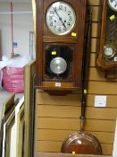 A vintage oak Vienna-style wall clock together with a copper bed warming pan