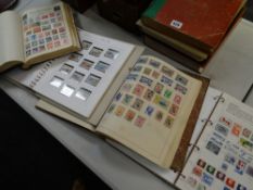 Four vintage albums mainly foreign & Commonwealth stamps