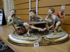 A large Capodimonte figure group entitled 'The Cheaters'