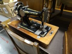 A vintage cased sewing machine