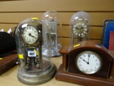 Three dome-topped mantel clocks together with a wooden French dome-topped mantel clock