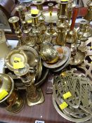 A tray of various brassware including candlesticks, trivets etc