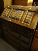 A vintage oak Old Charm four-drawer bureau