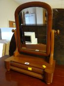 A small mahogany veneered toilet mirror