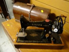 A vintage cased Singer sewing machine