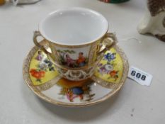 An Augustus Rex chocolate cup & stand having twin-handles and basket-saucer painted with alternate