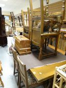A vintage Old Charm-style oak extending dining table together with six (2+4) matching drop in
