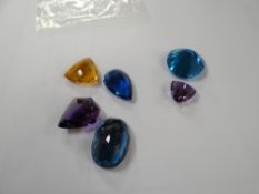 Six various loose gemstones
