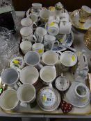 Two trays of various mixed china including mugs together with a small parcel of Royal Doulton