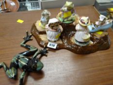 A Beswick / Doulton Beatrix Potter five-piece figure set on a wooden log effect base together with a