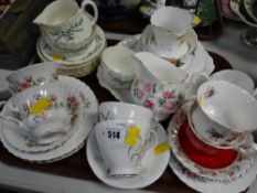 A collection of various teaware including Royal Albert 'Moss Rose', Royal Albert 'Festival', Royal