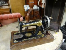 A vintage cased Singer sewing machine