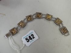 A believed silver & natural gold tile bracelet, marked 925 with 230 next to a star hallmark