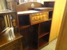 A dark wood Arts & Crafts bookcase with painted frieze of musicians to upper cupboard front