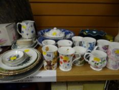 A parcel of various china plates & mugs