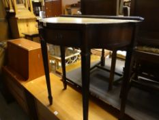 Reproduction mahogany bow fronted hall table with leather tool top