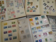 A parcel of five vintage stamp album containing mainly Eastern European, American & Commonwealth