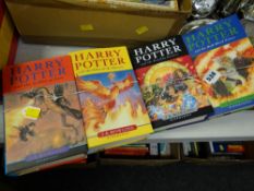 Four 1st edition Harry Potter hardback books with dust jackets