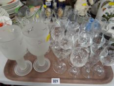 A tray of various drinking glasses
