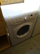A Hotpoint Aquarius washing machine in white E/T