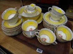 An English Chelson gilt rose & yellow decorated teaware