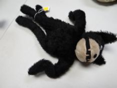 A vintage Felix the cat stuffed toy