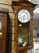 Vintage mahogany Vienna wall clock with circular face & Roman numerals